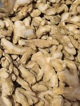 close-up of dried ginger pieces with rough textures