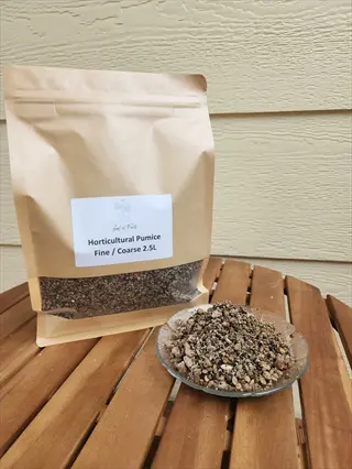 horticultural pumice bag and sample bowl for pumice stone gardening, fine/coarse mix on a wooden table