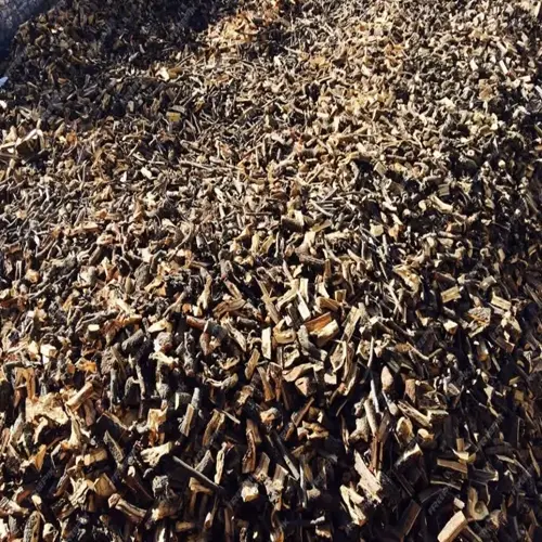 large pile of mulched garden weed-free wood chips for landscaping
